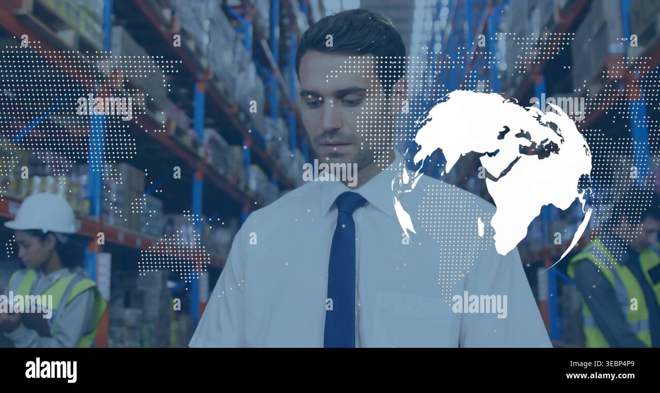 Standing manager in white shirt and dark tie scanning racks, workers with tablet, globe overlay Stock Photo