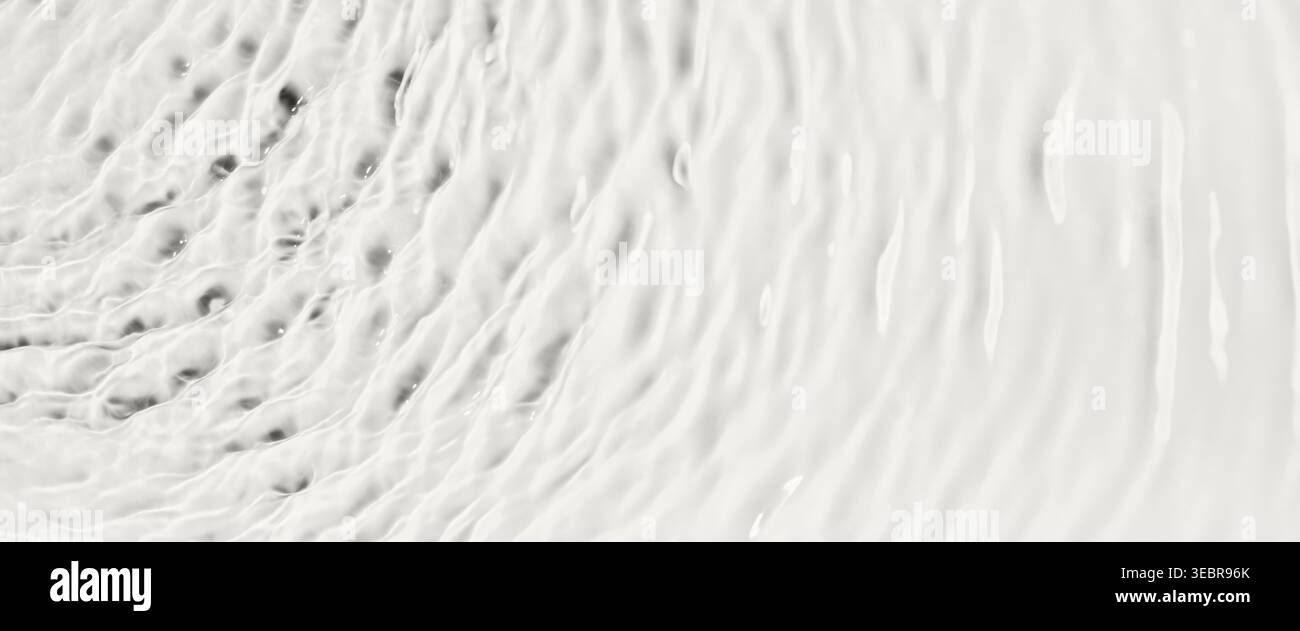 White fluid creating rippled surface with rhythmic wave patterns, banner format Stock Photo