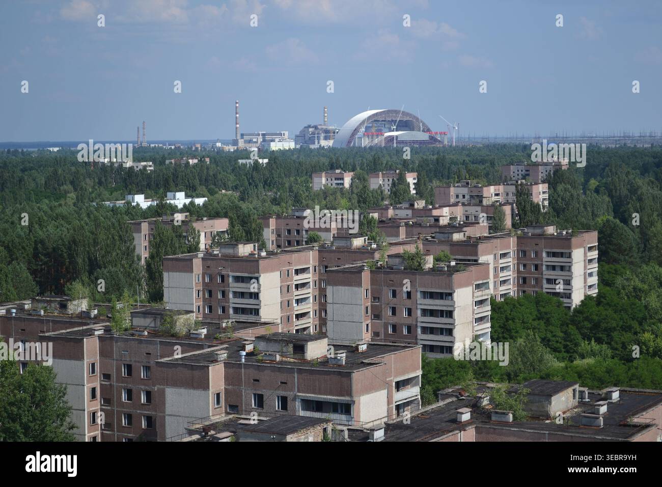 View from Pripyat rooftop towards Chernobyl’s Reactor 4, the decaying ...