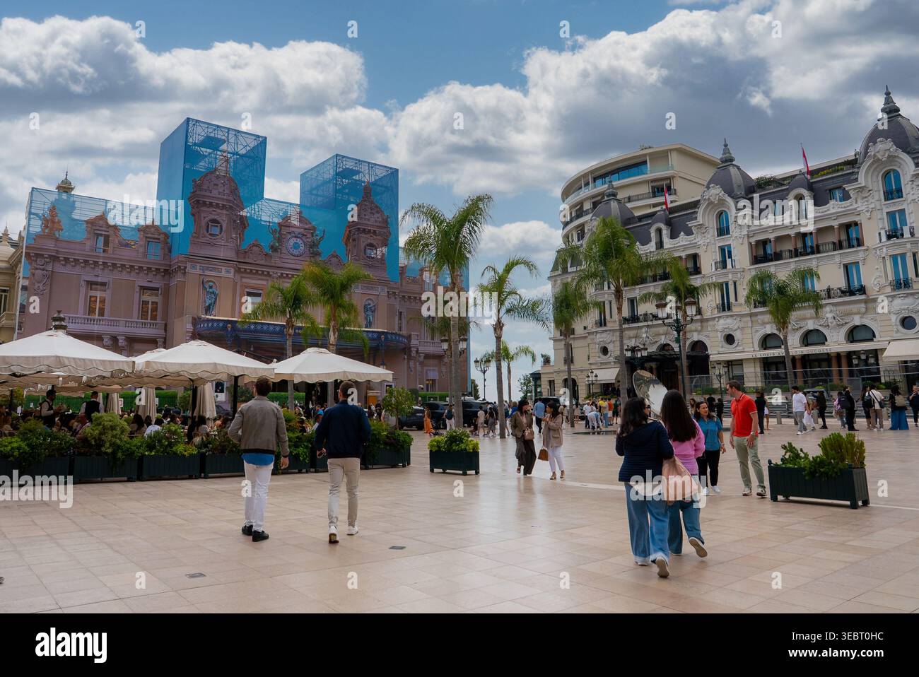 Monte Carlo plaza with Casino de Monte Carlo under renovation wraps Stock Photo