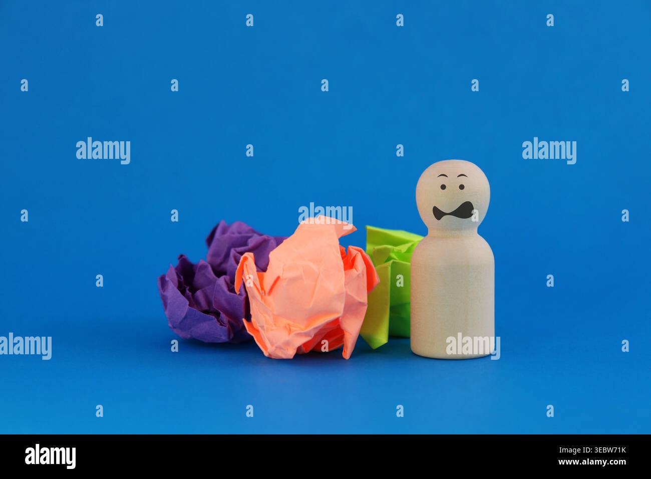 A person frustrated by discarding several ideas Stock Photo