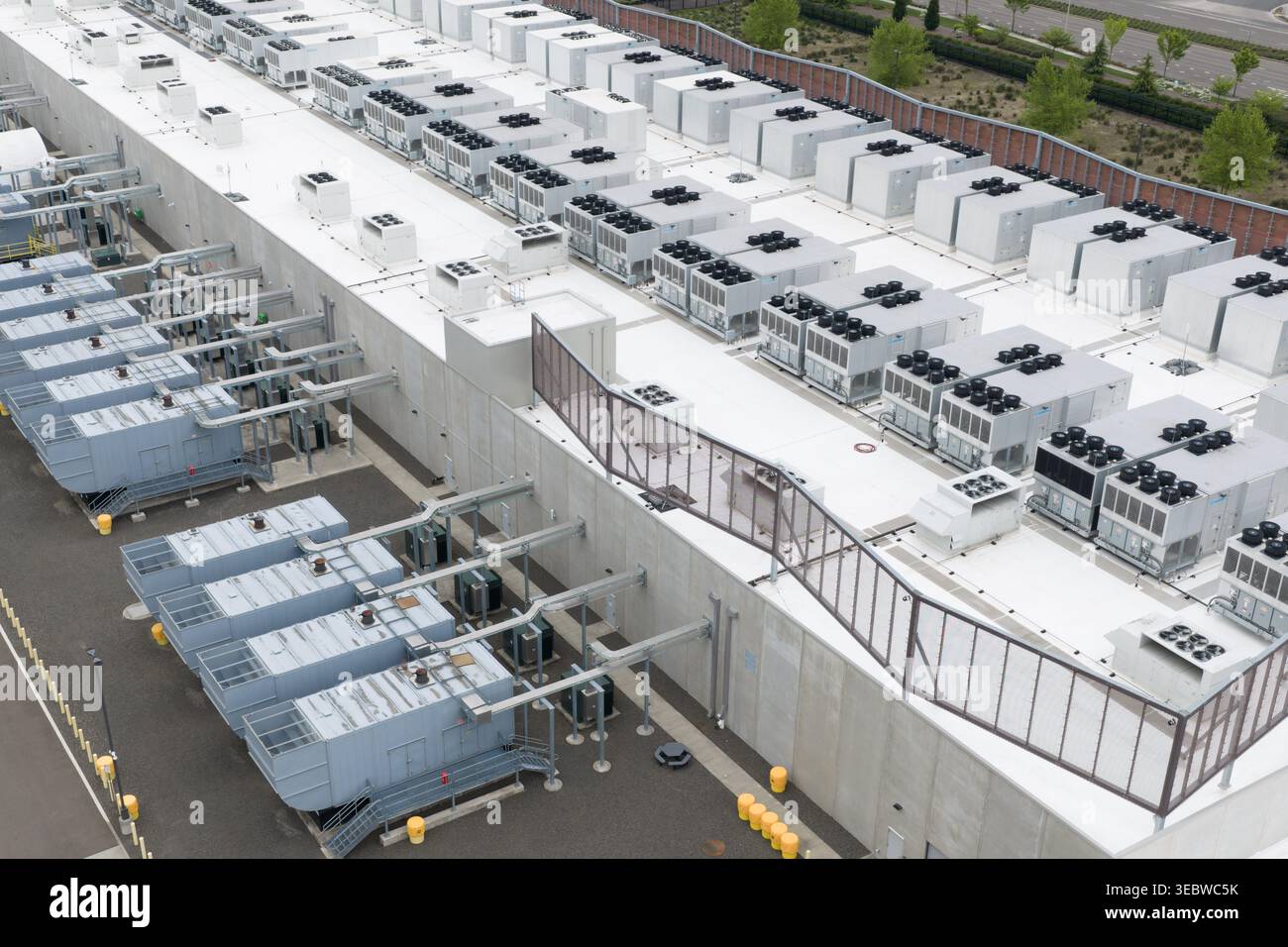 Data Center Rooftop Fans that are part of a cooling system are seen on the roof of a data ...