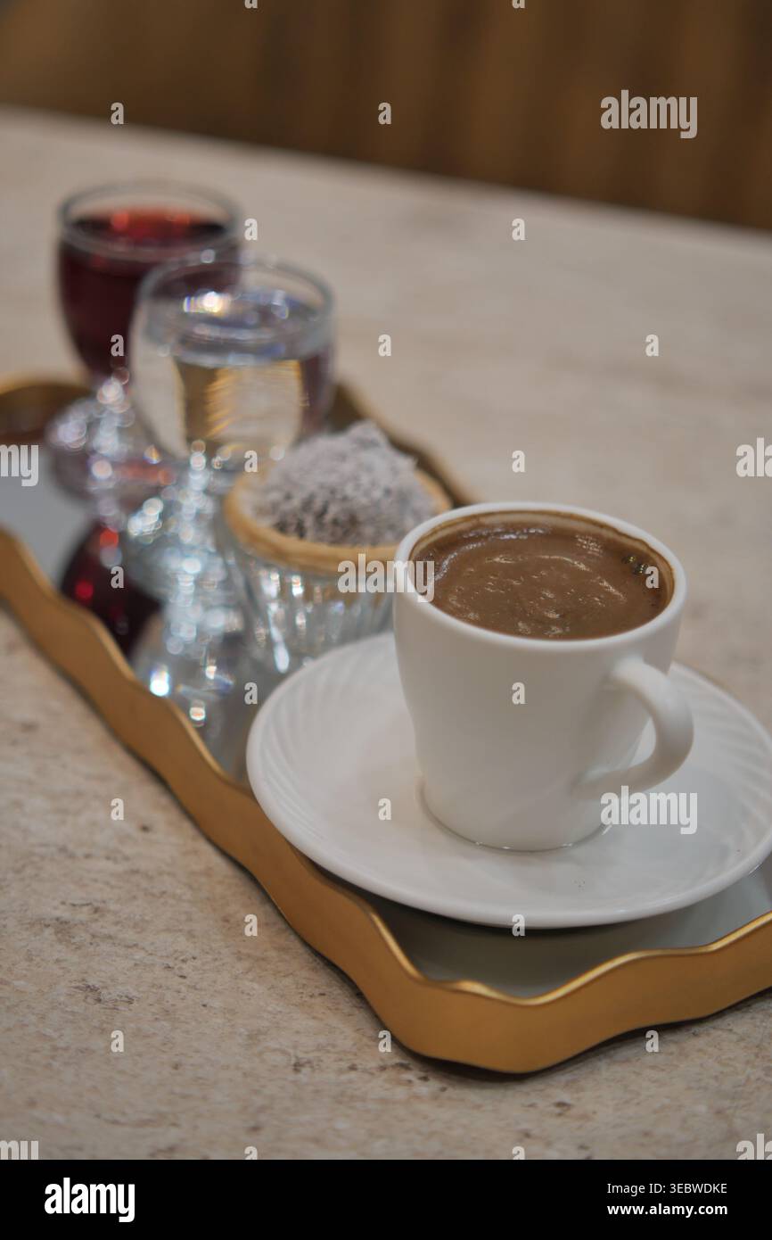 Turkish coffee and drinks served on a tray in a cafe setting Stock Photo