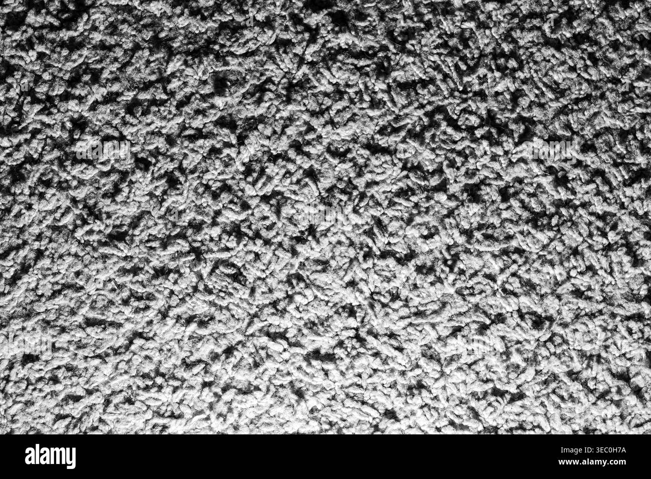 Grayscale abstract soft focus granular texture backdrop featuring an ...