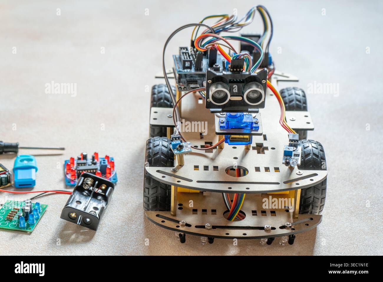 DIY toy Robot Car components. Educational electronics project for STEM learning and robotics. Stock Photo