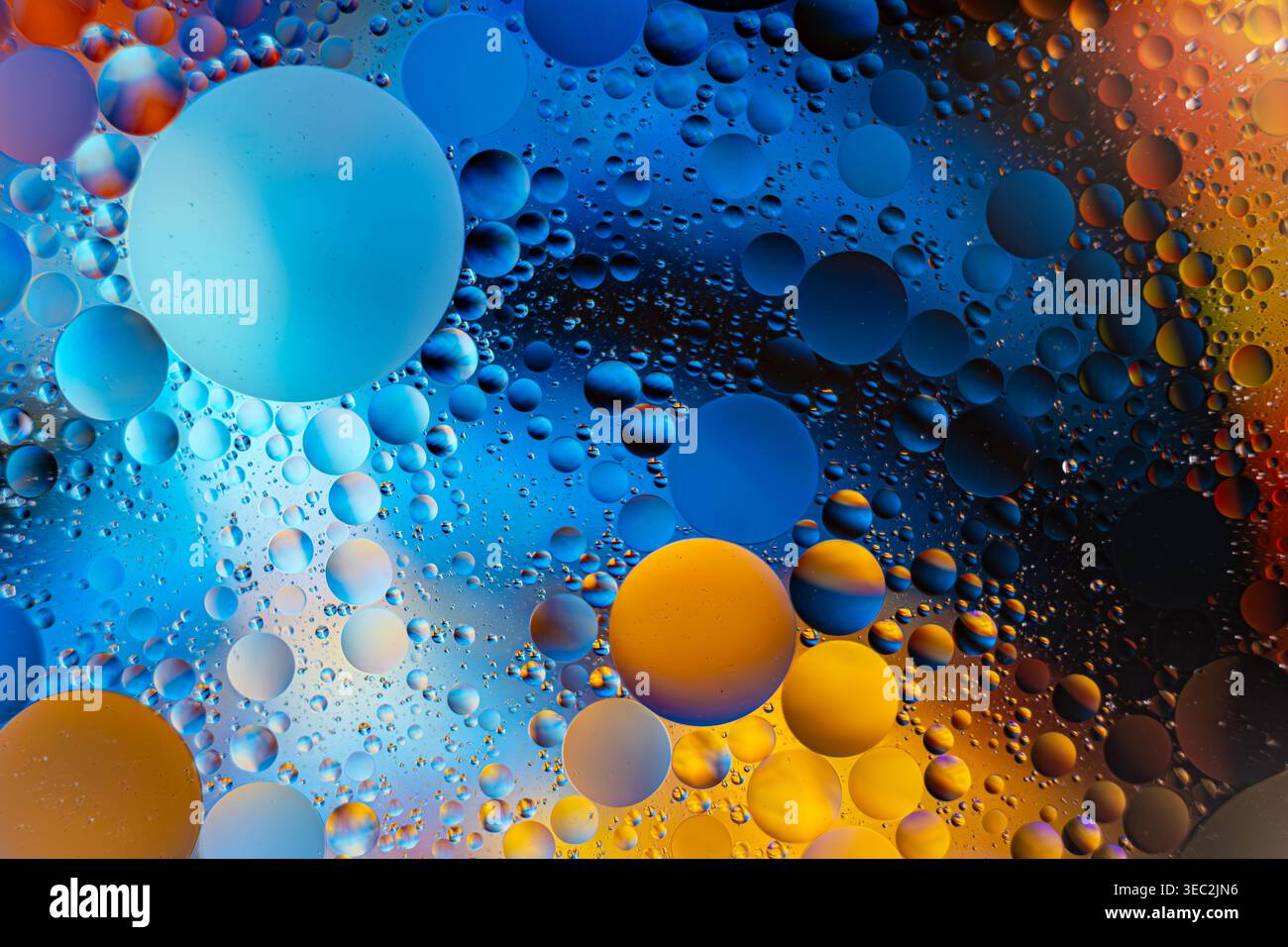 Dynamic Abstract Representation Of Luminous Petroleum Bubbles On Continuous Color Transition Surface Stock Photo
