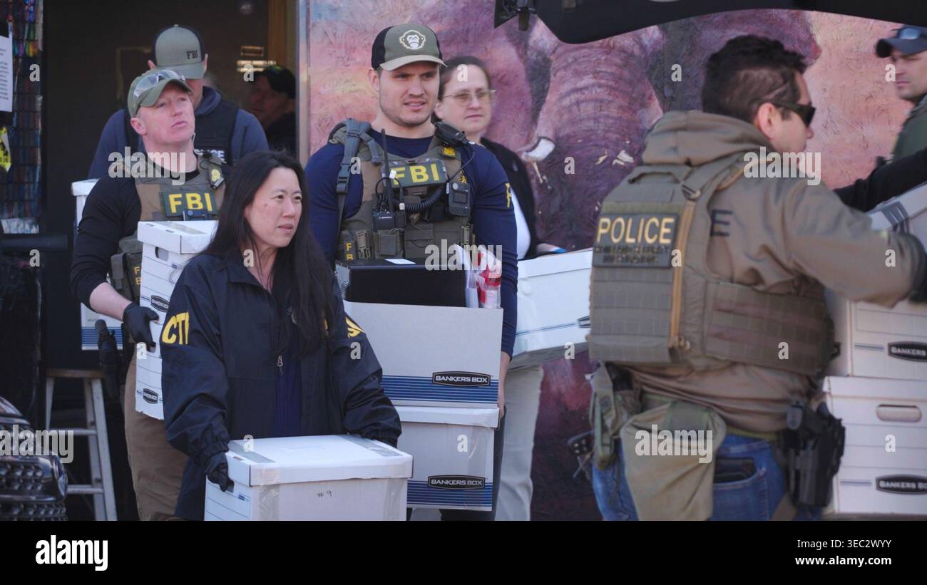 State and federal agents remove boxes of evidence collected from Metro ...