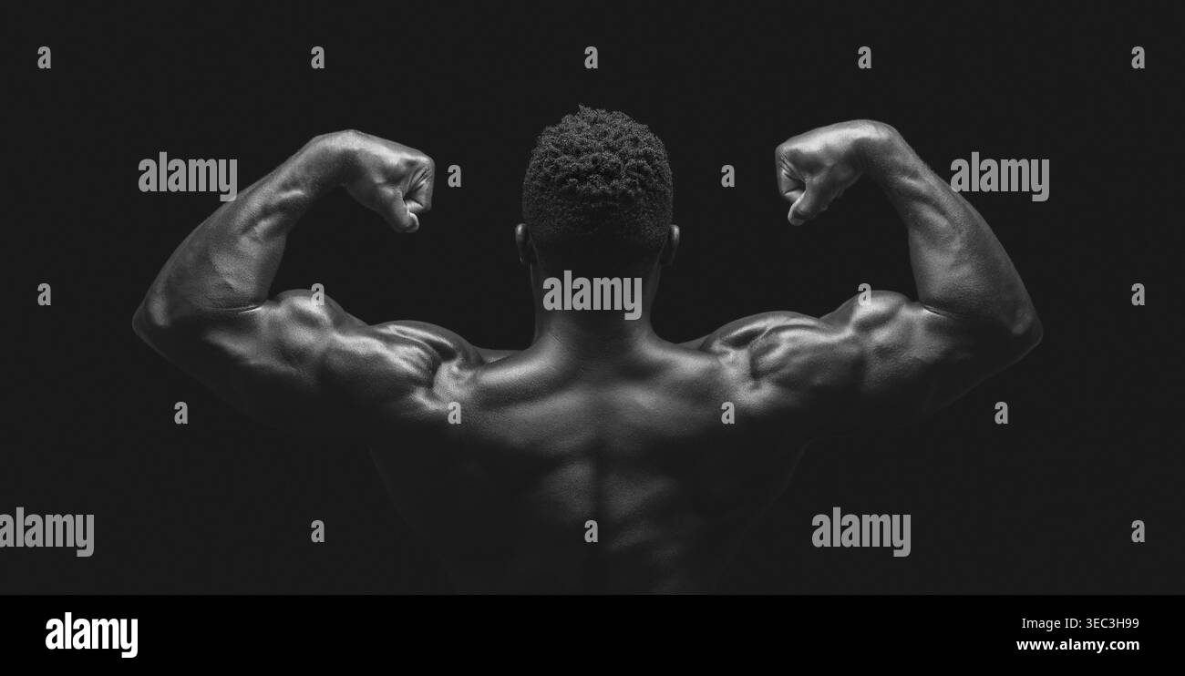 Show Strength Muscular Athlete Posing to Show Strength and Physique in Dramatic Black ...