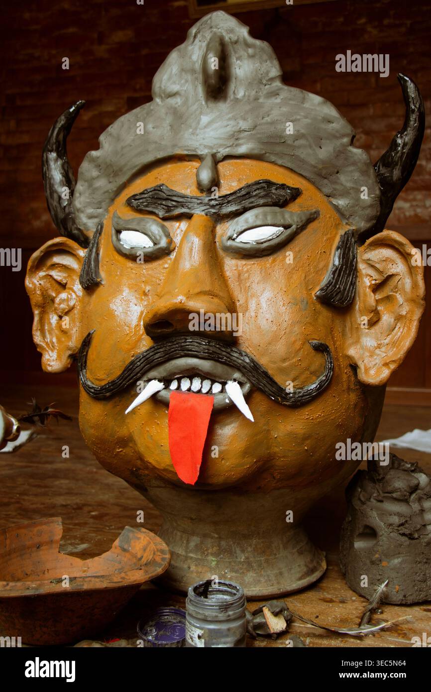 Mathmadus Demon Head of a mythical demon, Ghantakarna. Ghantakarna is he who wore bells ...