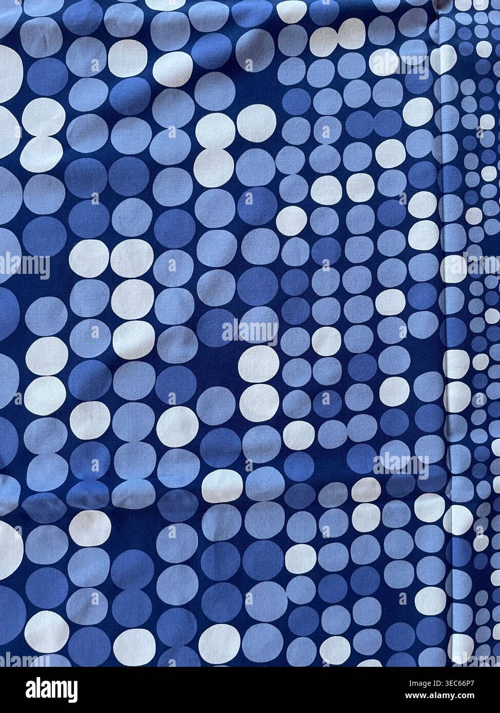 Abstract blue background with soft bokeh circles in varying sizes, creating a modern and elegant dynamic light pattern Stock Photo