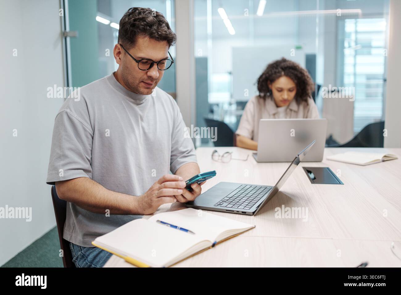 Professional Environment With Colleagues. Collaborative Workspace Showing Focused Team Members Stock Photo