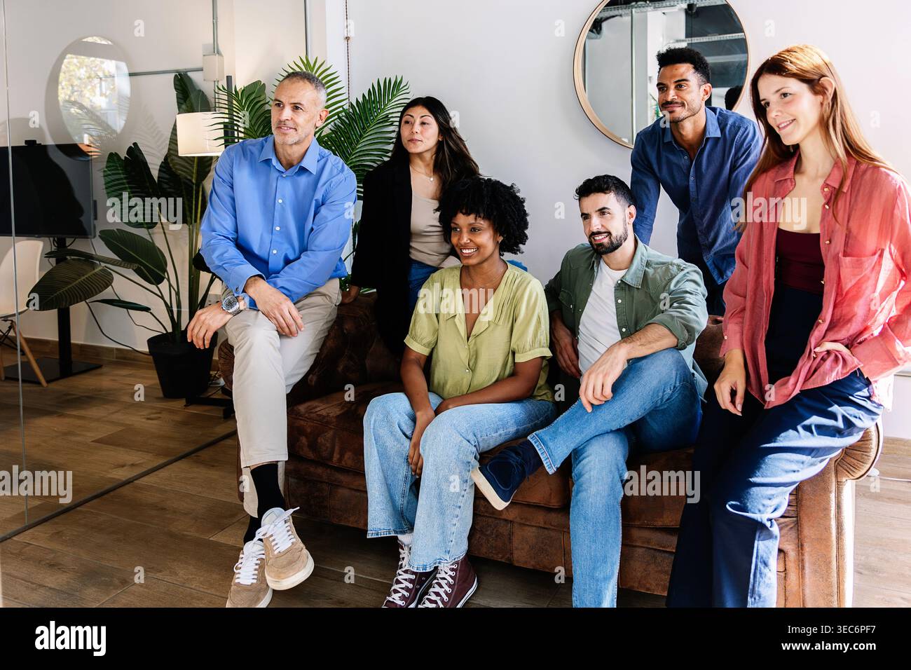 Business team collaborating during casual meeting in office Stock Photo