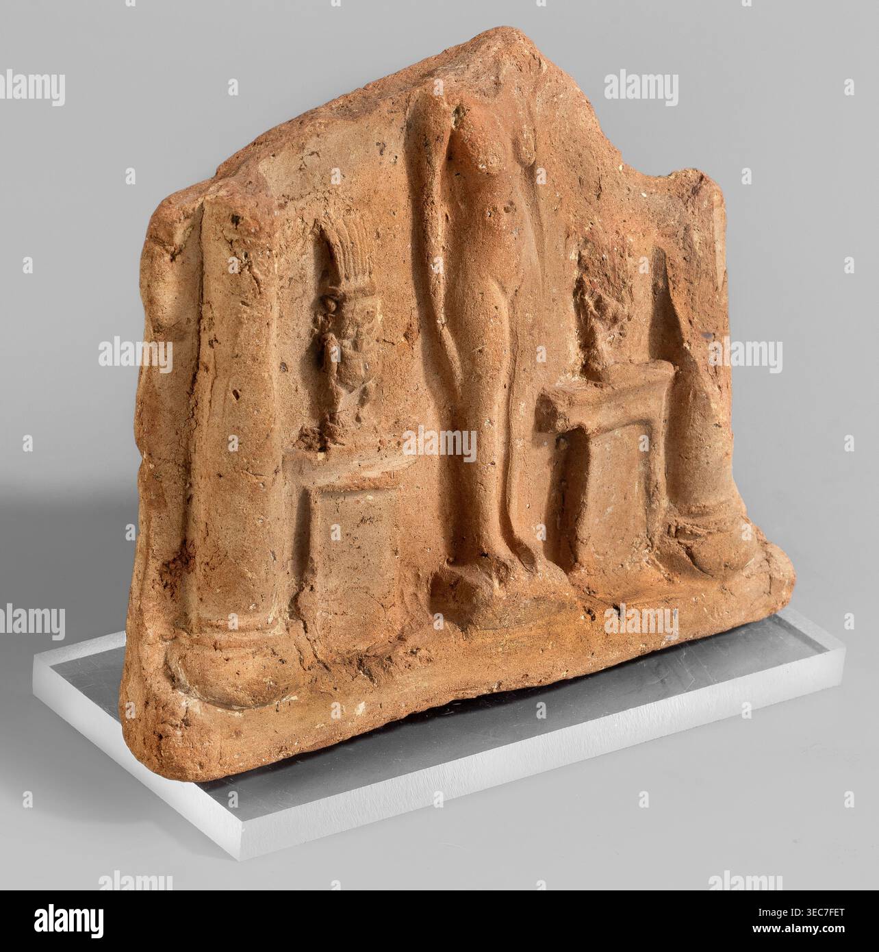 Fragment of a votive plaque in the form of a naos with the fertility ...