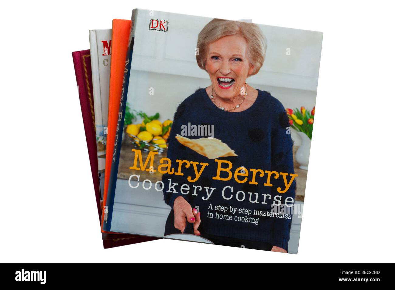 Selection of cookery books with Mary Berry Cookery Course book on top isolated on white background cookbook cookbooks cook book cook books Stock Photo