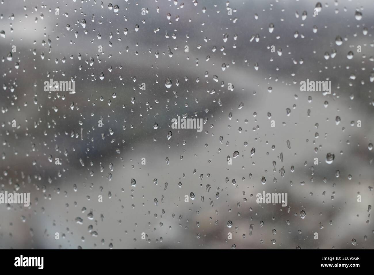 Raindrops On A Window Overlooking The Thames River Stock Photo