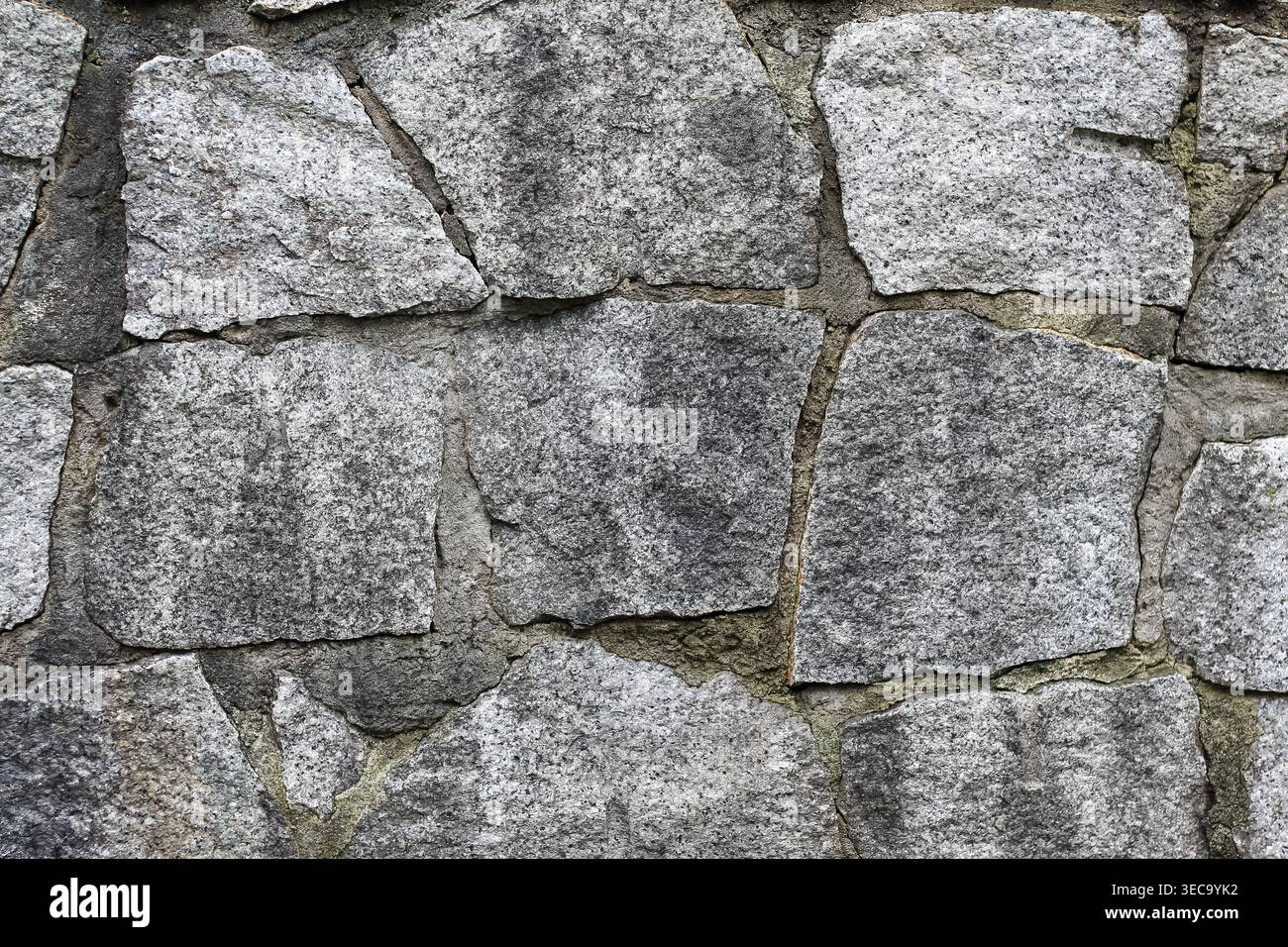 A Cold And Gray Flagstone Wall Stock Photo