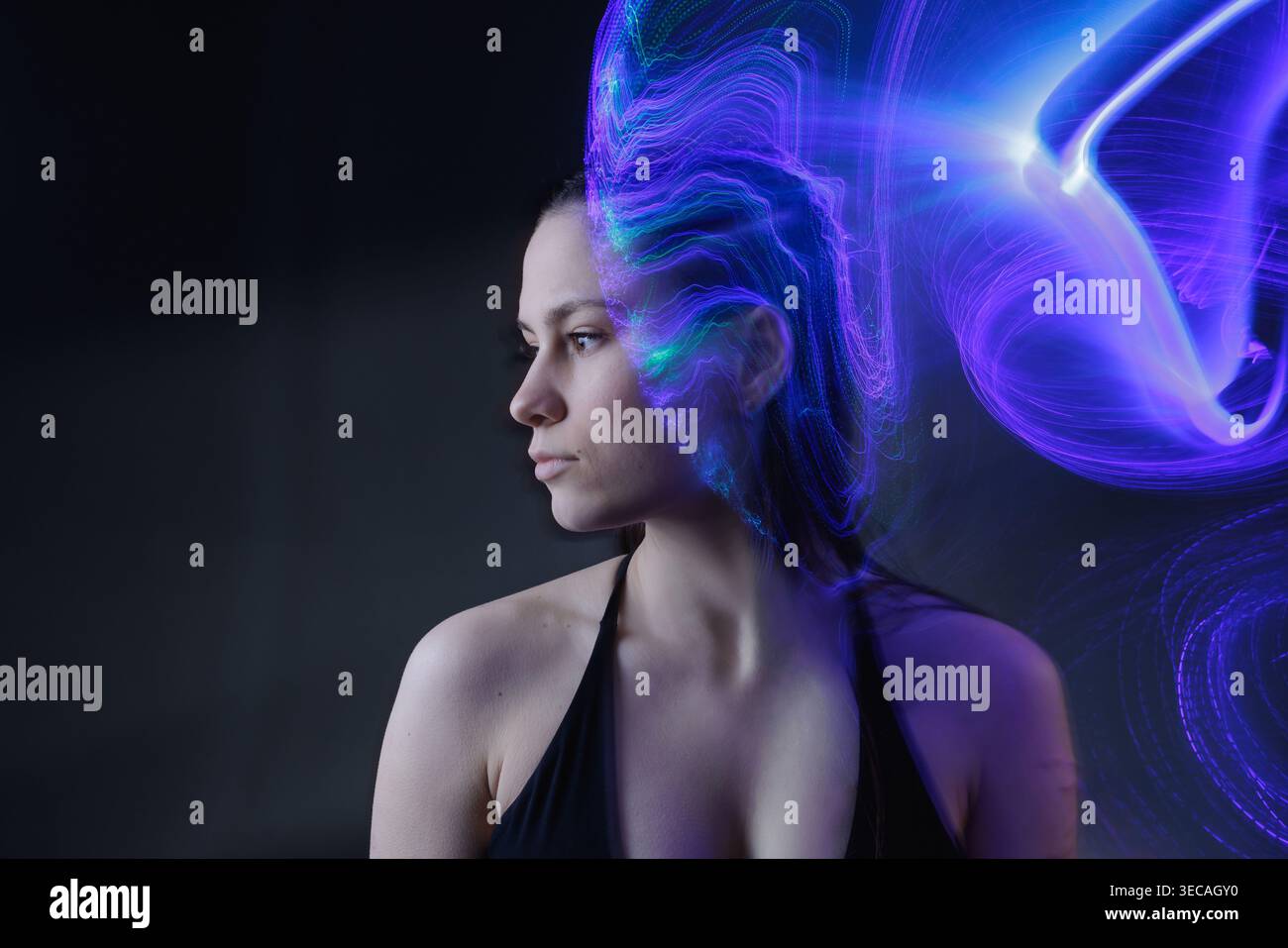 Portrait with dynamic light field representing artificial intelligence, neural networks, and cognitive processes. Stock Photo