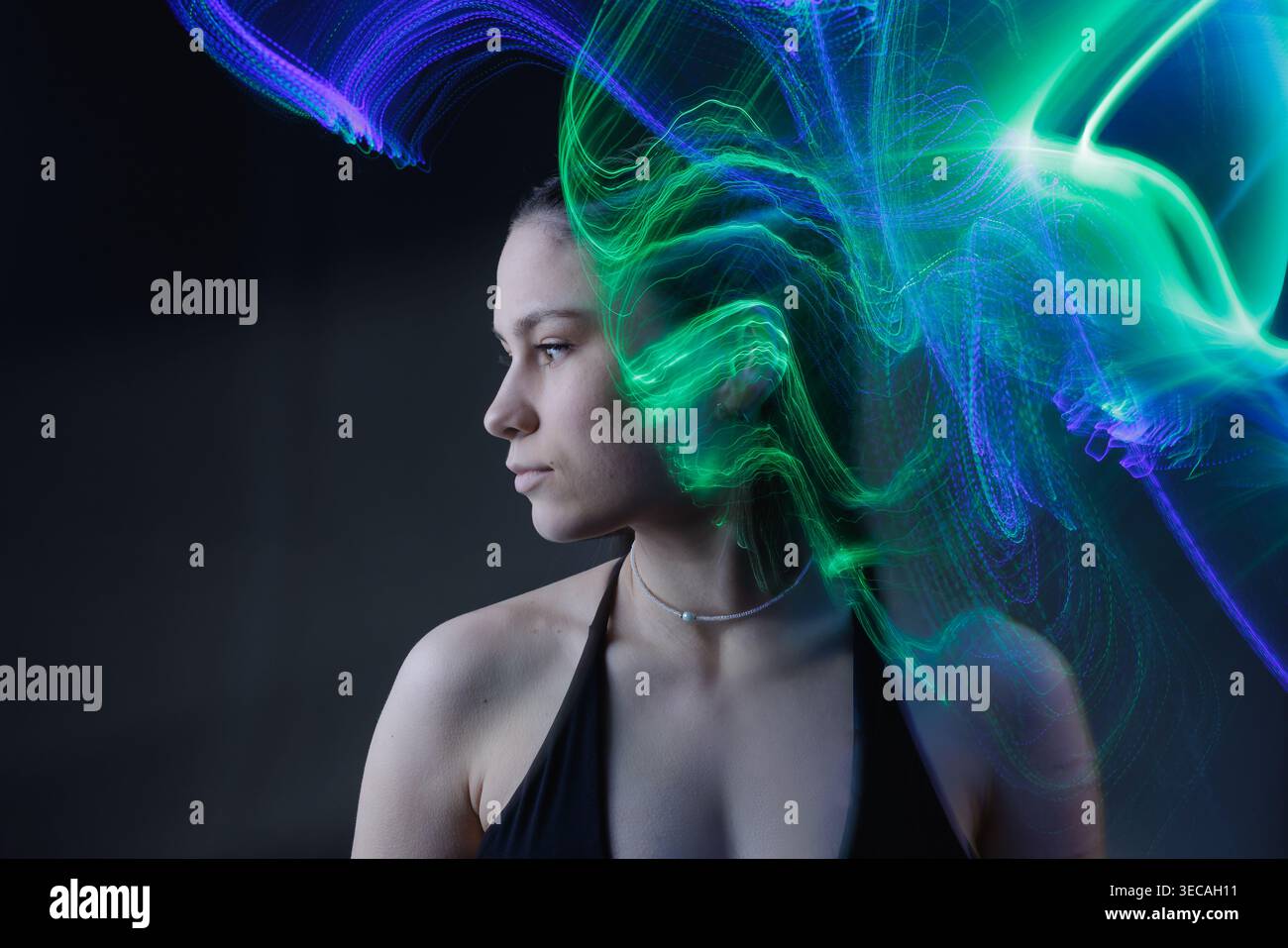 Female portrait with flowing purple waves visualizing neural signals, AI systems, and data processing. Stock Photo