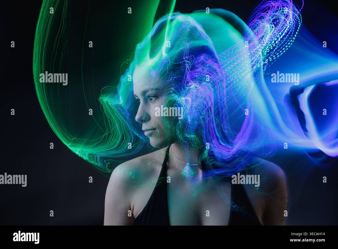 Female portrait with green digital lines visualizing neural data, AI processing, and brain activity. Stock Photo
