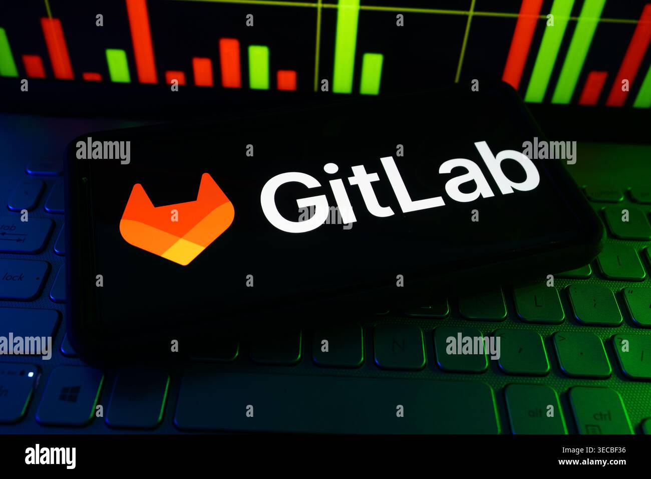 GitLab DevOps Platform Company Logo Displayed On Digital Screen With Software Development And Cloud Engineering Background Stock Photo