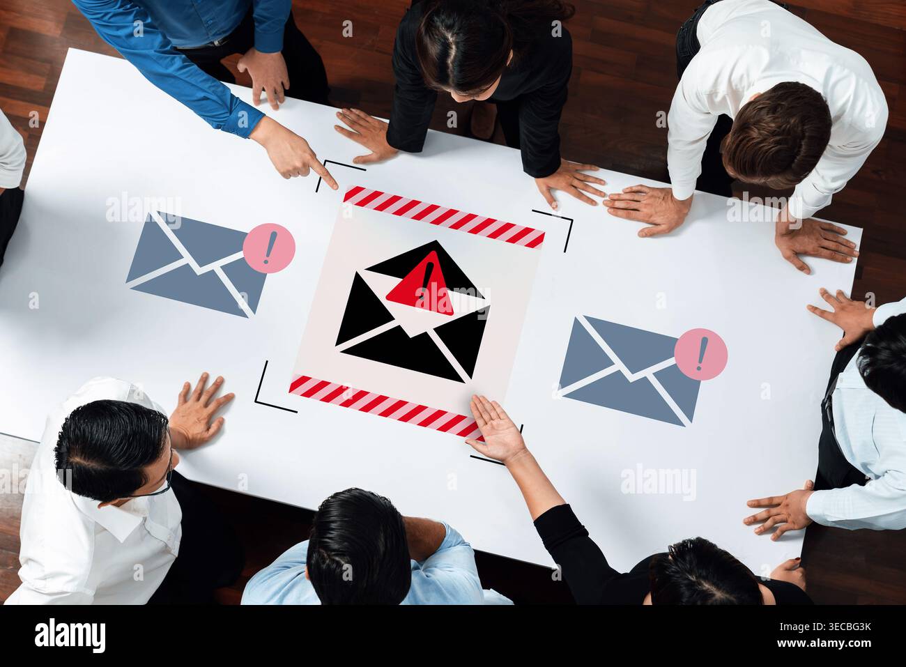 A diverse group of business professionals engages in a serious discussion about the dangers of email phishing attacks, emphasizing cybersecurity aware Stock Photo