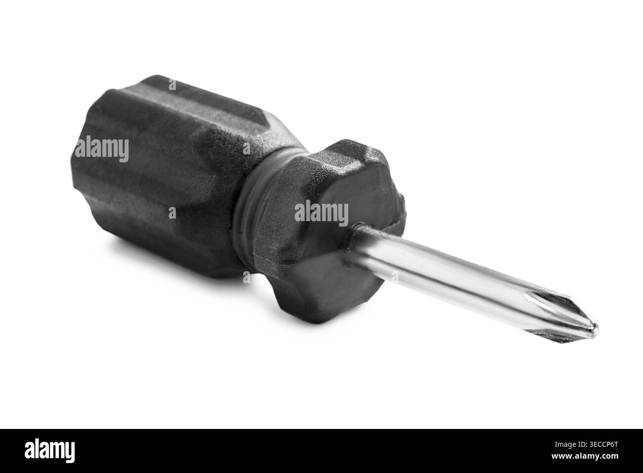 Small crosshead screwdriver lying isolated on white background Stock Photo