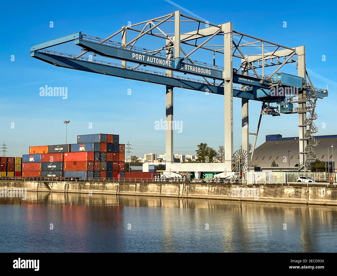 Strasbourg, France - 11 April 2022: Heavy crane on the quayside of the city's container terminal on the Rhine River - Smartphone Captured Stock Image