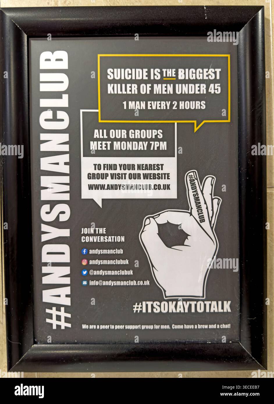 ANDYSMANCLUB workplace poster promoting male mental health support, suicide prevention and the #ItsOkayToTalk message. Stock Photo