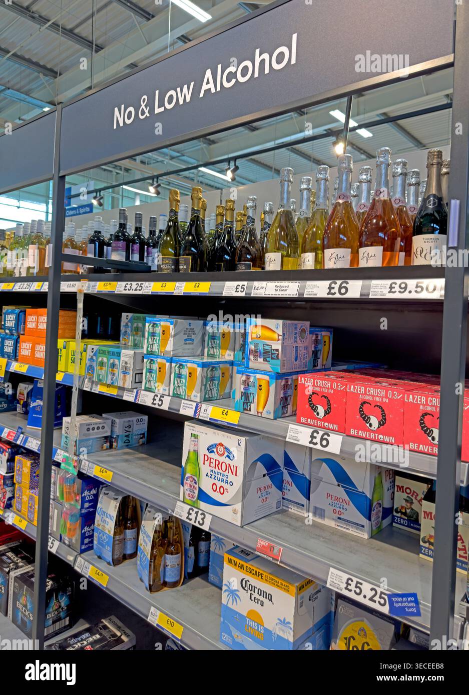 Low and no alcohol drinks range shelf in a large Tesco superstore, showing alcohol-free beer, cider and wine alternatives Stock Photo