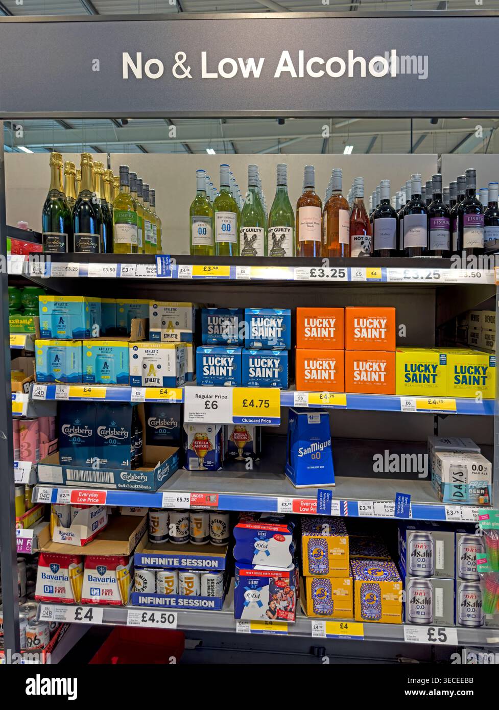 No and low alcohol drinks range in a Tesco supermarket aisle, with alcohol-free beer, wine and spirits for healthier lifestyles Stock Photo