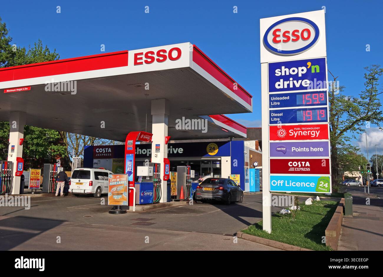 Esso Latchford service station in Warrington showing high petrol and diesel prices during global oil market pressure, US Israel Iran war Stock Photo