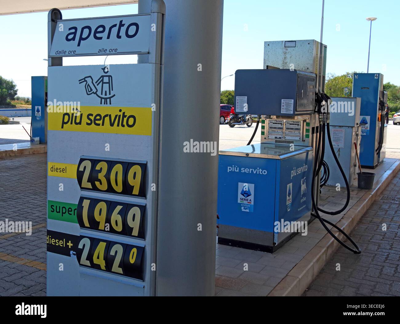 High Italian petrol station prices per litre, with diesel, super and diesel plus shown on a forecourt fuel sign during oil market tension. Stock Photo