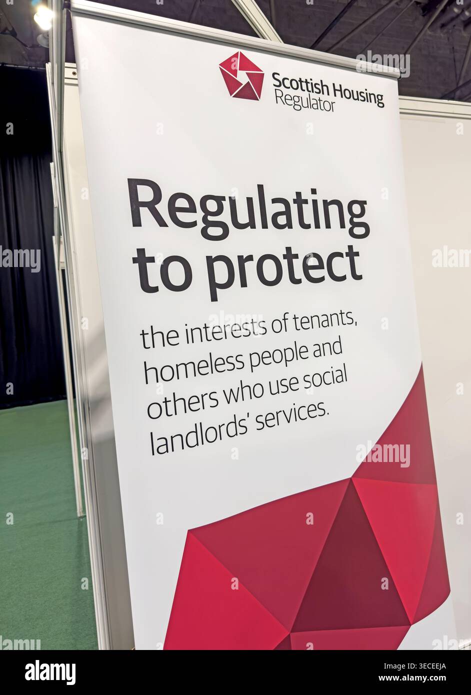 Scottish Housing Regulator banner displays its social housing protection message for tenants and homeless people in Scotland Stock Photo