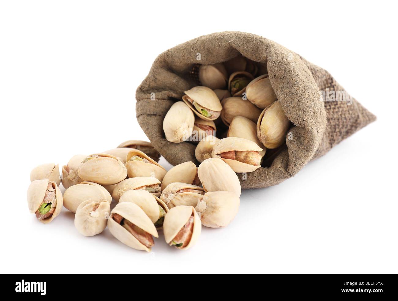 Pistachio nuts in sack isolated on white Stock Photo