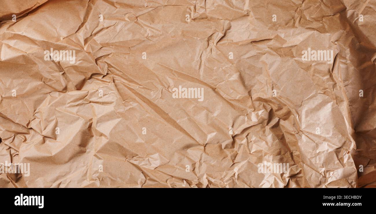Large Crumpled Kraft Paper Texture Background Stock Photo