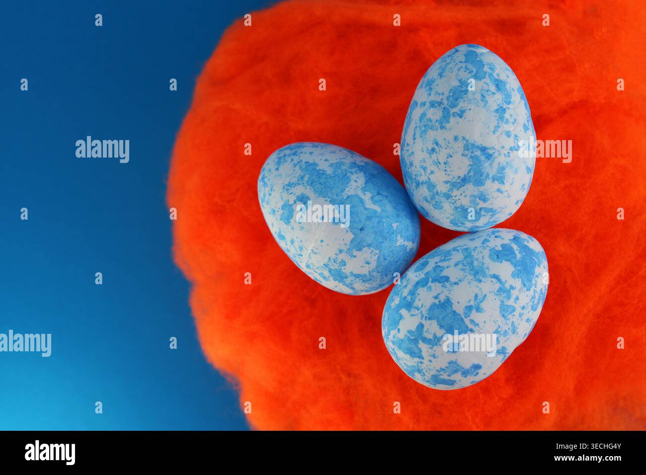 Three spotted eggs on a nest Stock Photo