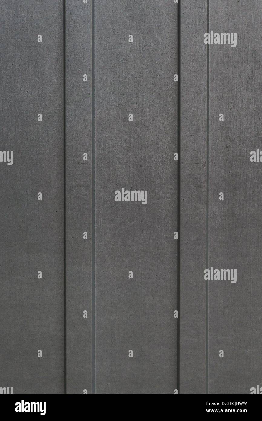 Dark gray metal panels with vertical lines Stock Photo