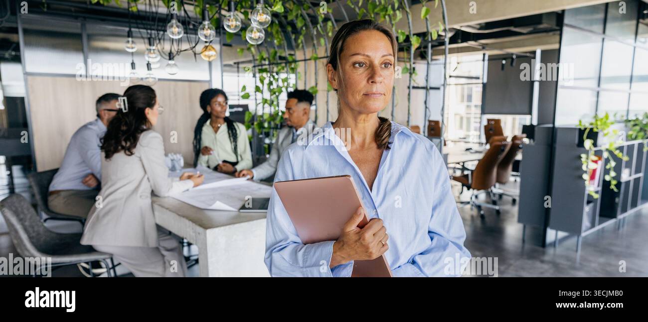 Supervising collaborative design critique session leader Stock Photo