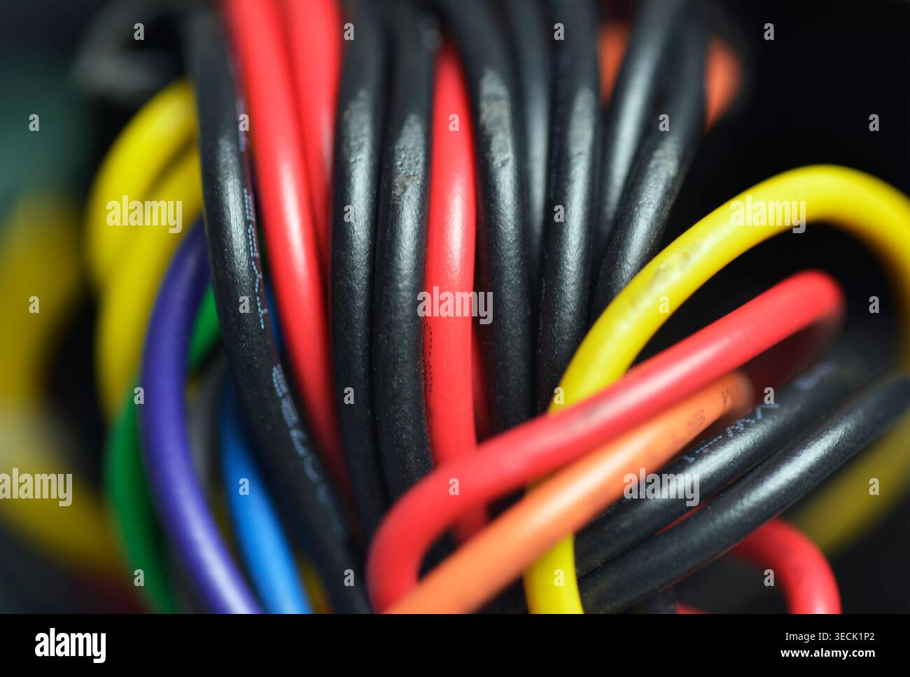 Multi coloured wires on the motherboard of a computer Stock Photo - Alamy