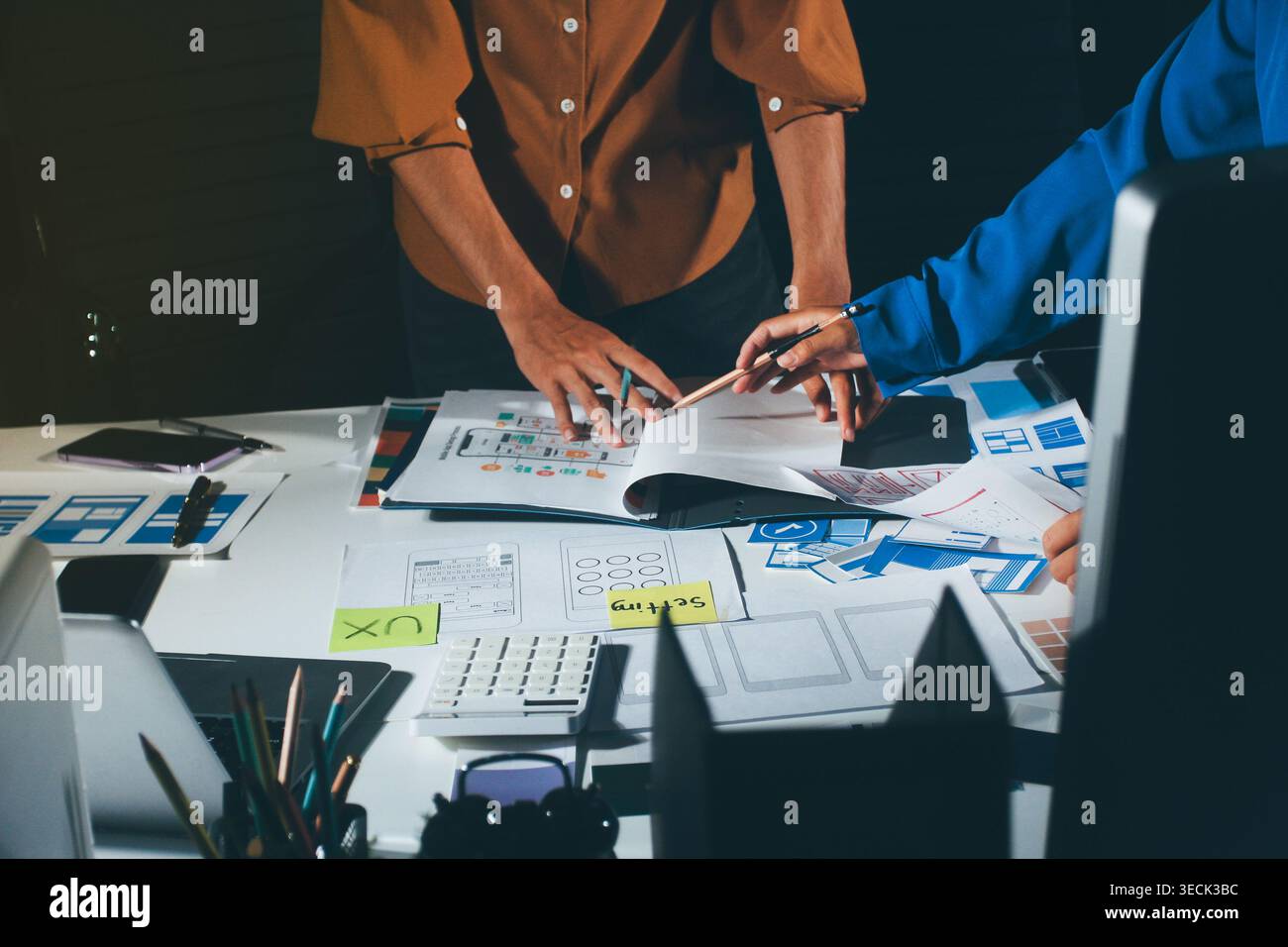 UXUI design brainstorming session with sketches and digital tools Stock Photo