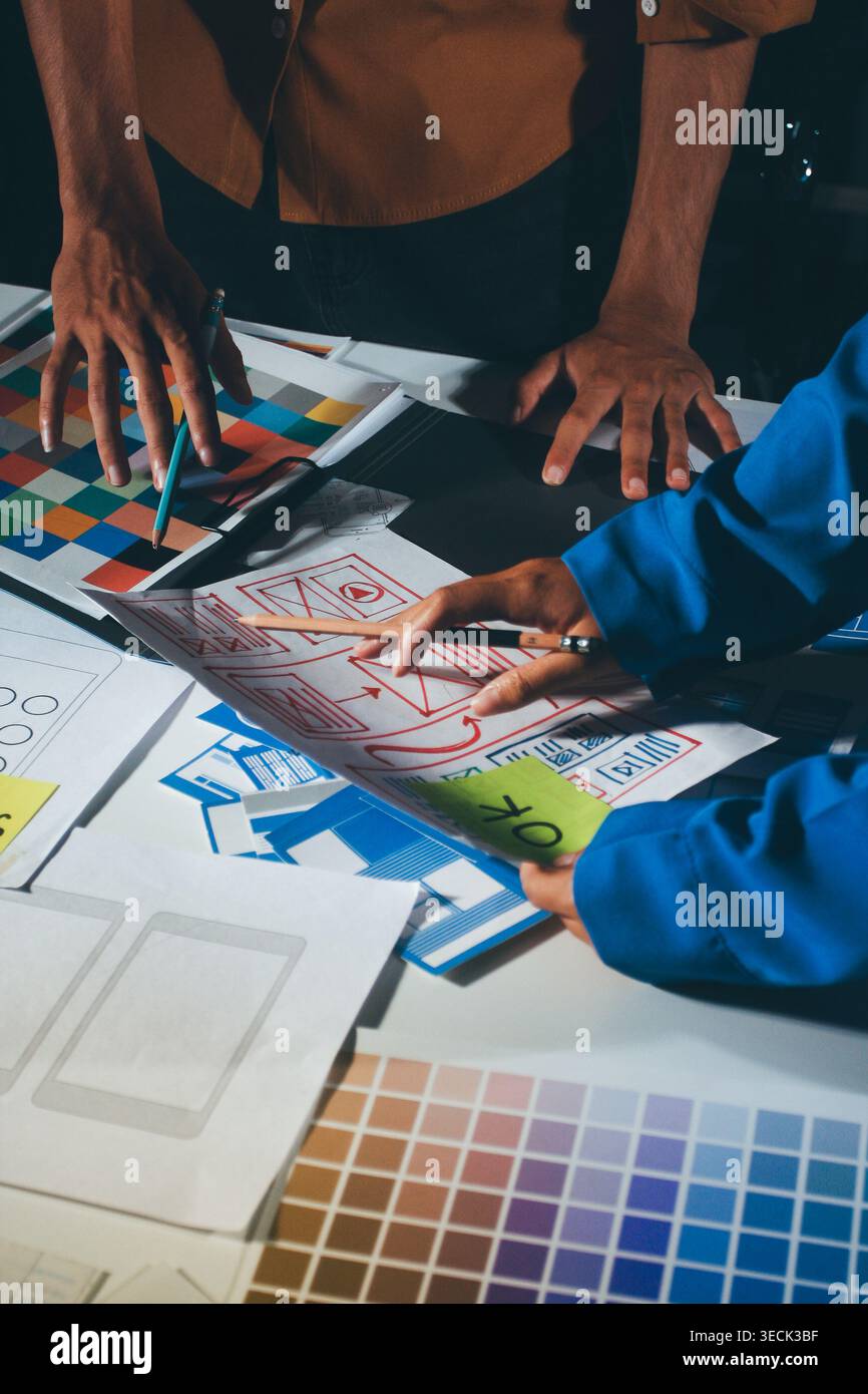 UXUI design brainstorming session with sketches and digital tools Stock Photo