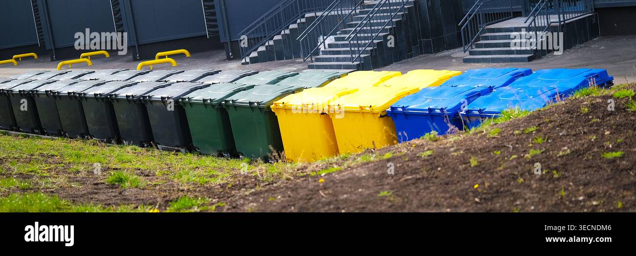 Lots of colorful plastic garbage containers Stock Photo