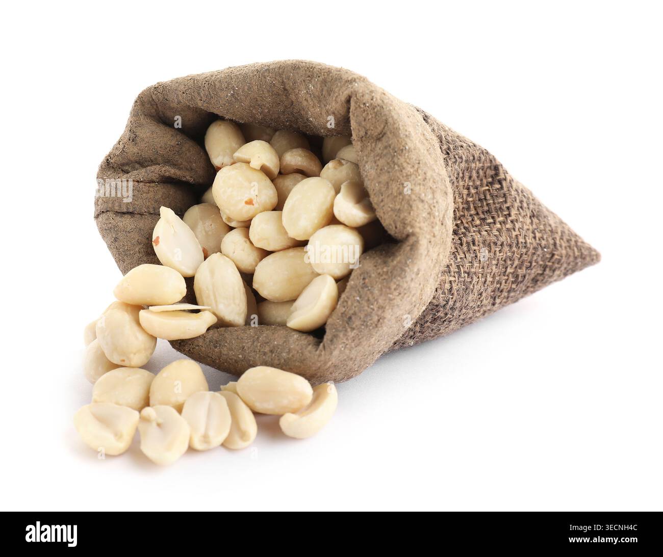 Tasty peanuts in sack isolated on white Stock Photo