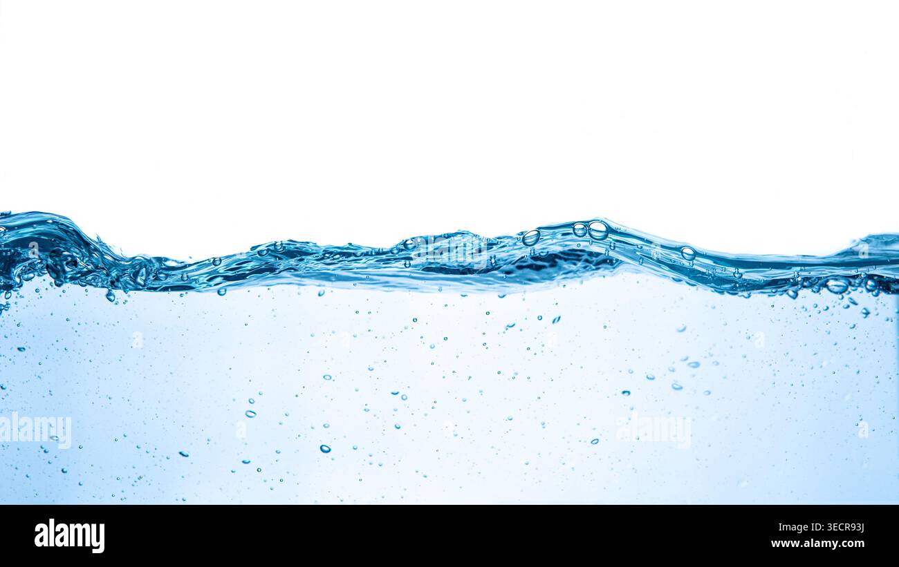 Water creating a wave effect with bubbles and splashes against a white background Stock Photo