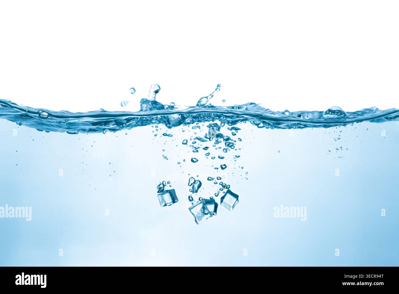 Ice cubes dropping into clear water creating bubbles and splashes Stock Photo
