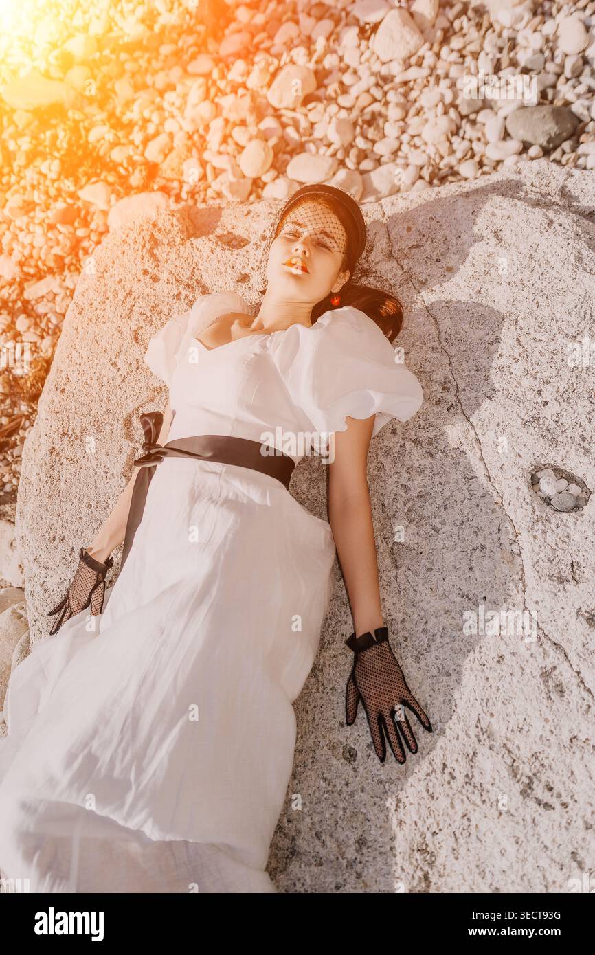 Young lady reclining in dress hi-res stock photography and images - Alamy