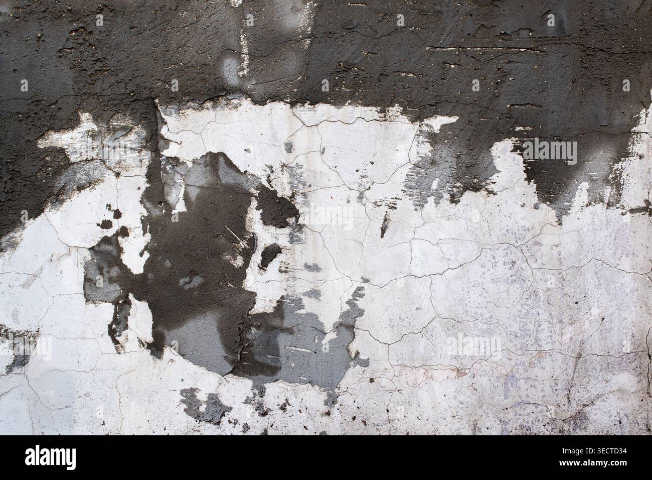 Grunge style cracked weathered cement surface Stock Photo