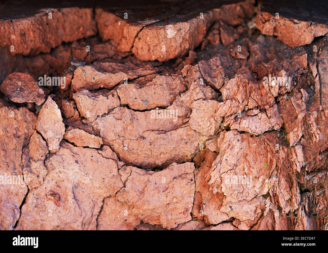 Demaged bricks and stone red orange surface Stock Photo