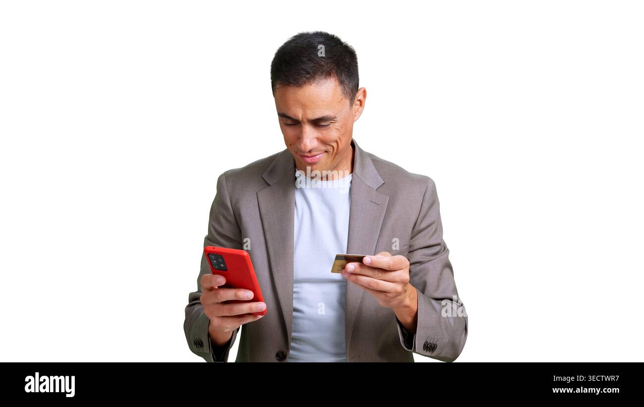 Man making online payment using smartphone and credit card Stock Photo