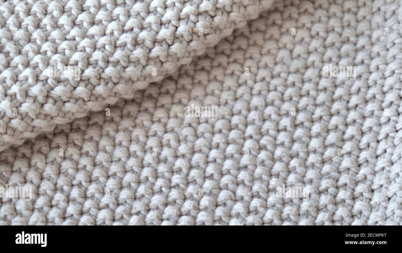 Beige Knitted Fabric Texture with Soft Cozy Pattern Stock Photo